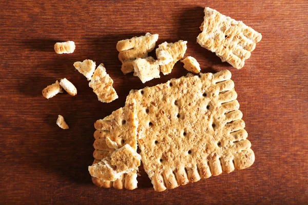 Crushed cookie on wooden background — Stock Photo, Image