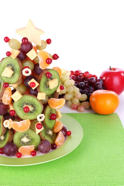 Fruit Christmas tree on table on white background — Stock Photo, Image