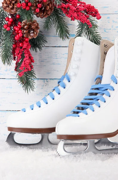 Figure skates on wooden background — Stock Photo, Image