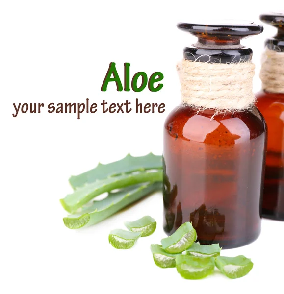 Fresh green aloe leaves and medicine bottles, isolated on white — Stock Photo, Image