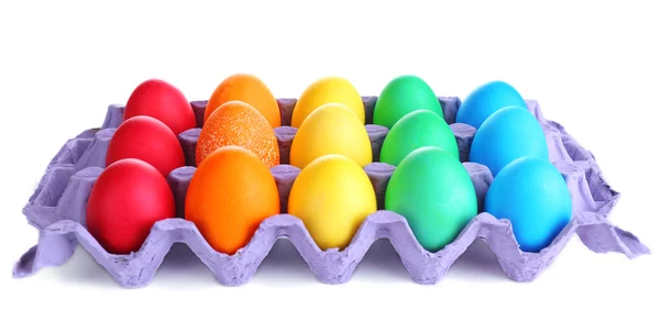 Coloridos huevos de Pascua en bandeja aislada en blanco — Foto de Stock