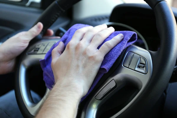 Hand with microfiber cloth polishing car — Stock Photo, Image