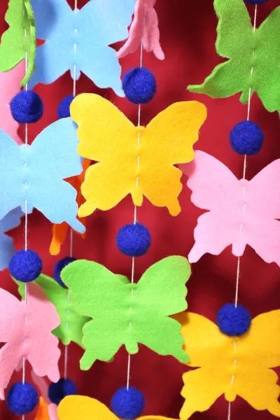 Handgemaakte garland op kleur achtergrond — Stockfoto