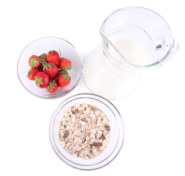 Healthy cereal in bowl with milk and strawberries isolated on white — Stock Photo, Image