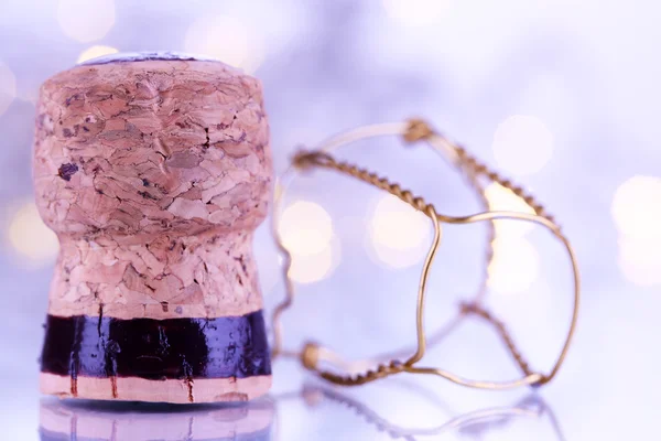 Champagne cork på jul ljus bakgrund — Stockfoto