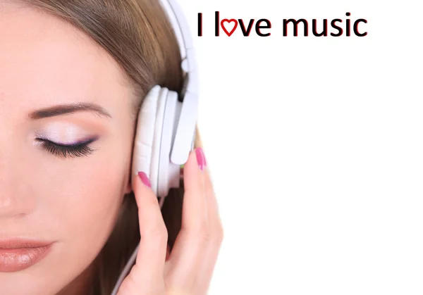 Молода дівчина слухає музику ізольовано на білому — стокове фото