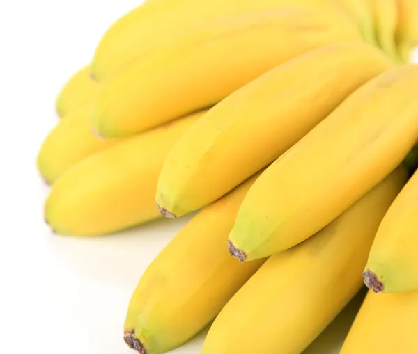 Куча мини-бананов, изолированных на белом — стоковое фото