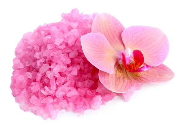 Beautiful blooming orchid flower  and heap of sea salt, isolated on white — Stock Photo, Image