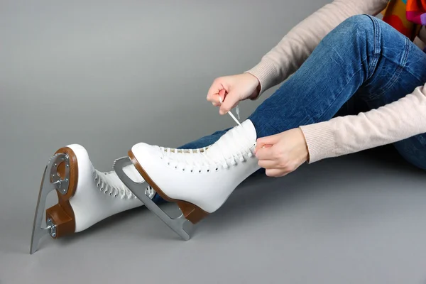 Skater wearing skates on gray background — Stock Photo, Image