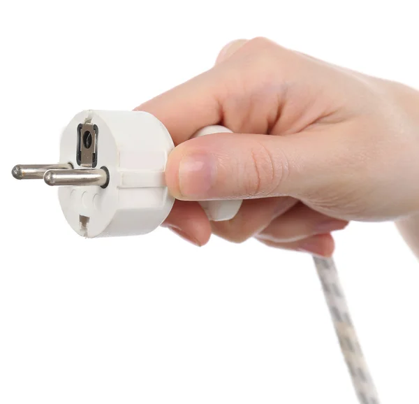 Ręka trzyma wtyczki elektrycznej na białym tle — Zdjęcie stockowe
