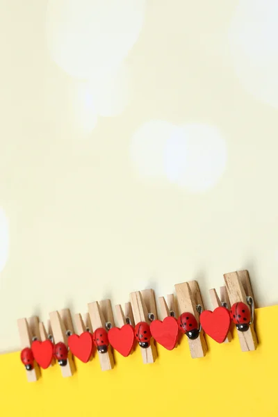 Abstract background with colorful wooden pins and paper — Stock Photo, Image