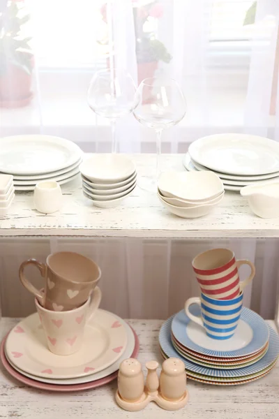 Different tableware on shelf in the interior — Stock Photo, Image