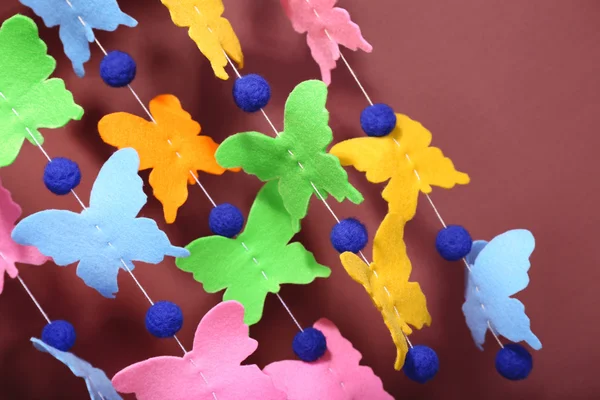 Handgemaakte garland op kleur achtergrond — Stockfoto