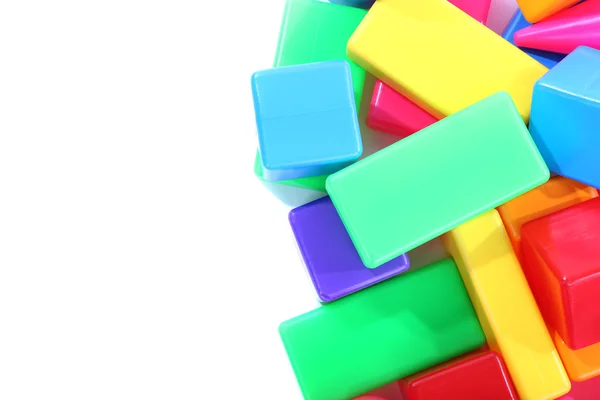 Красочные пластиковые игрушки, изолированные на белом — стоковое фото