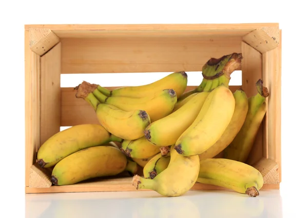 Bunch of mini bananas in wooden box isolated on white — Stock Photo, Image