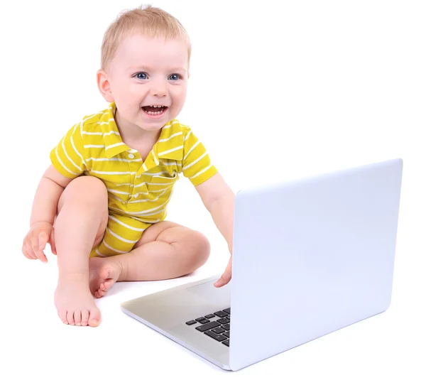 Cute little boy with laptop isolated on white Royalty Free Stock Photos