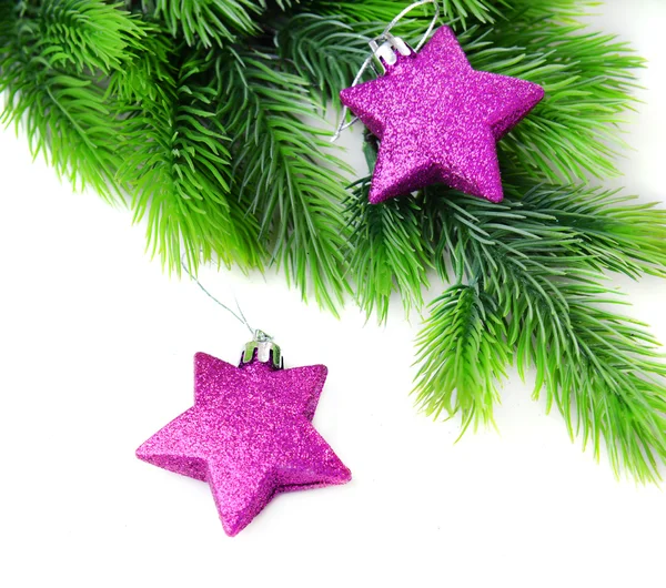 Kerst decoratieve sterren op fir boom, geïsoleerd op wit — Stockfoto