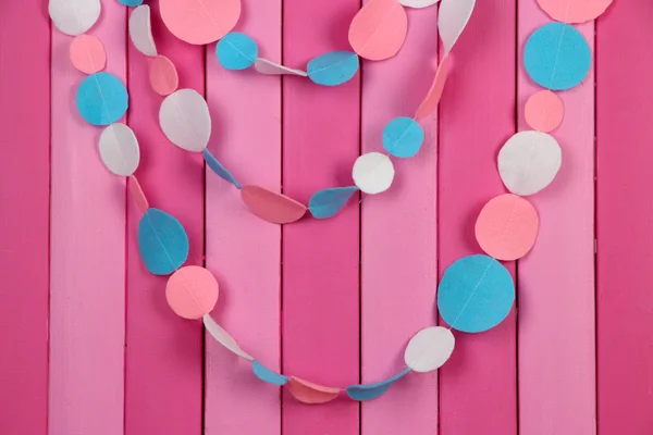 Decorative felt garland on wooden background — Stock Photo, Image