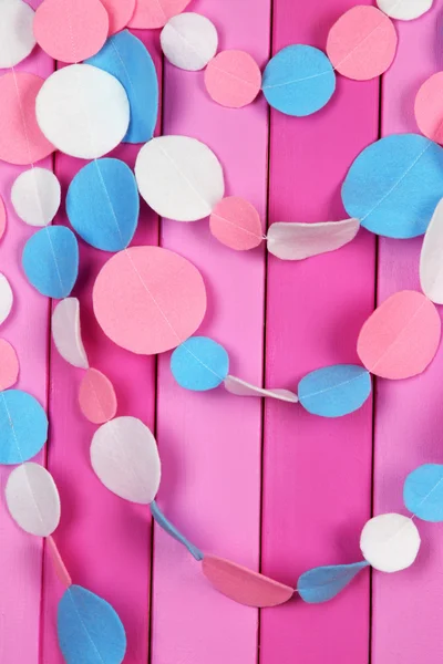 Decorative felt garland on wooden background — Stock Photo, Image