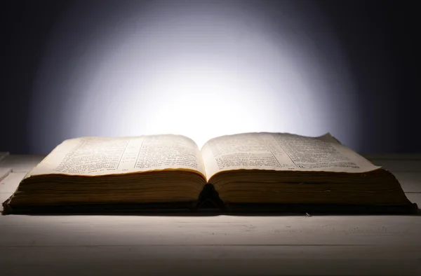 Old book on table on grey background — Stock Photo, Image