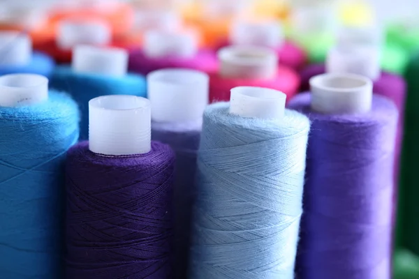 Multicolor sewing threads background — Stock Photo, Image