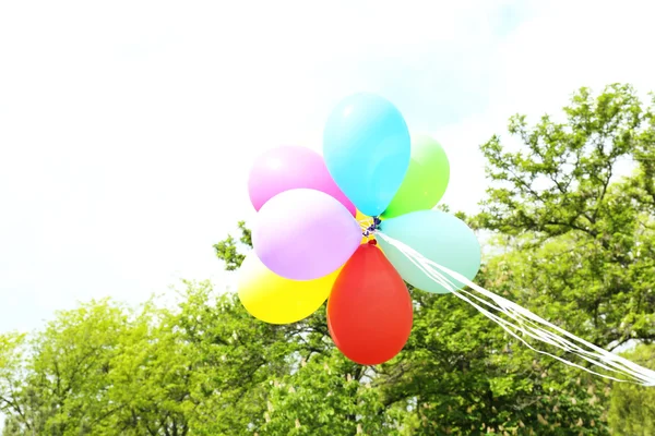 Balloons flying outdoors — Stock Photo, Image