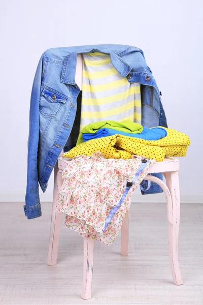 Clothes on chair — Stock Photo, Image