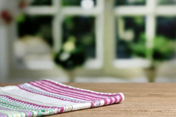 Fondo con mesa de madera y mantel —  Fotos de Stock