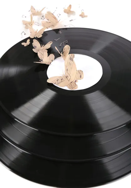 Gamla vinylskivor med papper fjärilar, isolerad på vit — Stockfoto