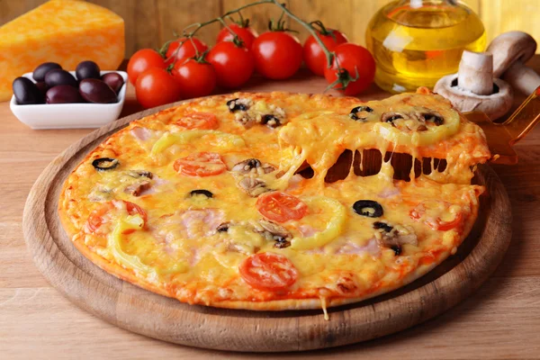 Tasty pizza on table close-up