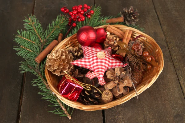 Christmas decorations in basket — Stock Photo, Image