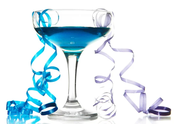 Glass of cocktail and streamer after party isolated on white — Stock Photo, Image