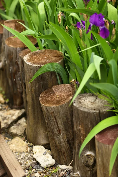Old wooden fence in the garden — Stock Photo, Image