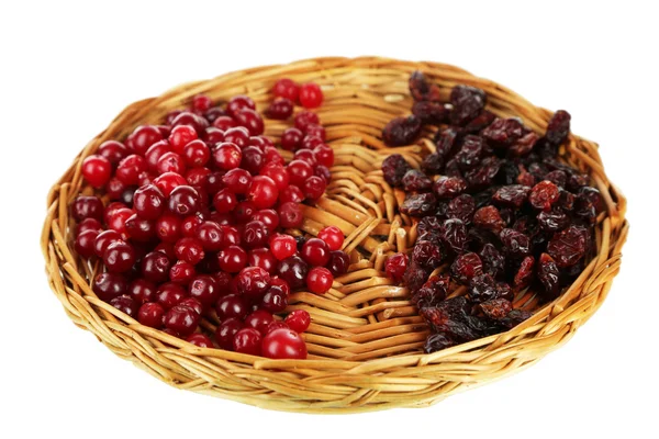 Fresh and dry cranberry on wicker mat, isolated on white — Stock Photo, Image