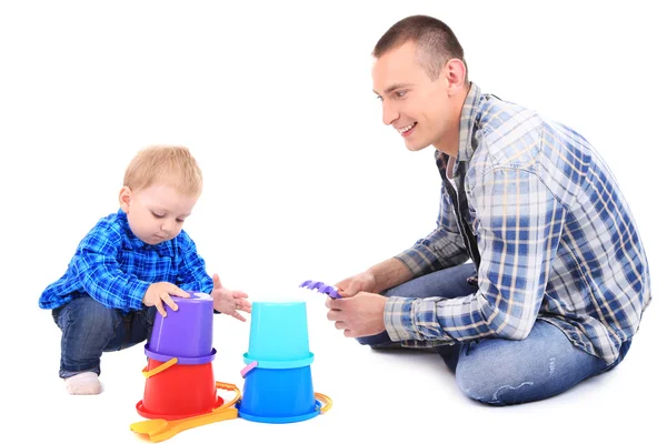 Feliz joven padre jugando con su pequeño hijo aislado en blanco — Foto de Stock