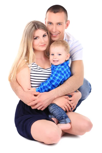 Lyckliga unga par med små baby isolerade på vit — Stockfoto