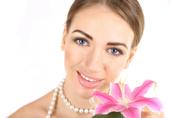 Porträt eines hübschen Mädchens mit Blume auf weißem Hintergrund — Stockfoto