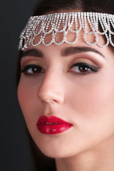 Girl with red lips on dark background — Stock Photo, Image