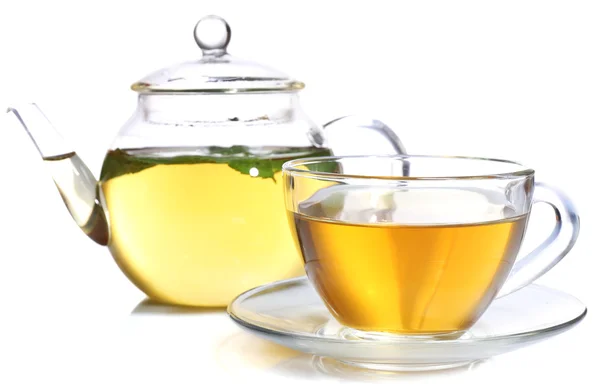 Composition of fresh mint tea in glass cup and teapot and brown sugar isolated on white — Stock Photo, Image