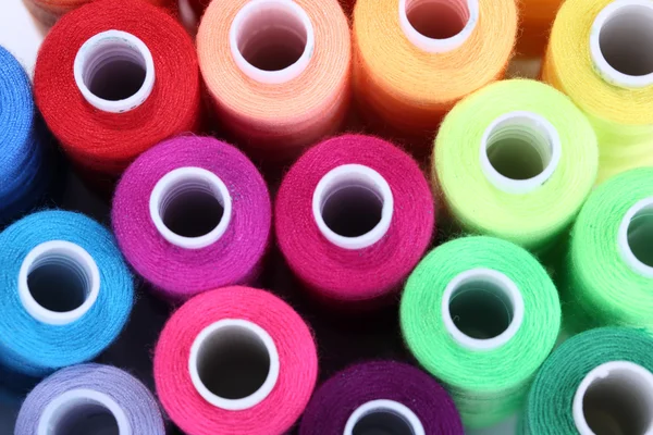 Multicolor sewing threads background — Stock Photo, Image