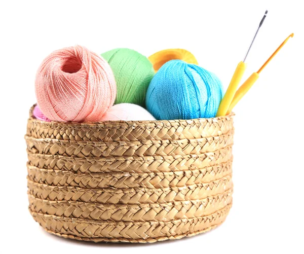 Colorful yarn for knitting in wicker basket and crochet hook, isolated on white — Stock Photo, Image