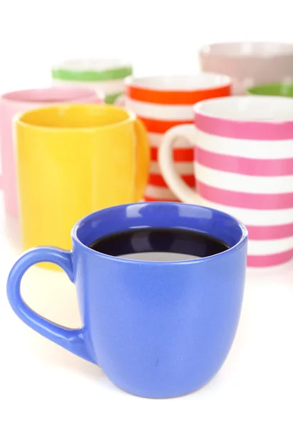 Muchas tazas de café aislado en blanco — Foto de Stock