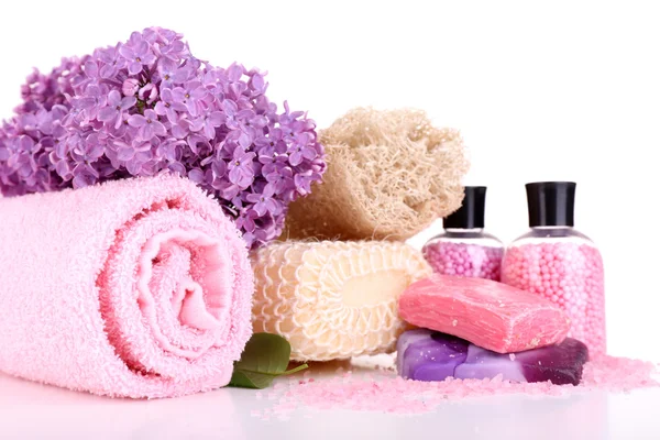 Composition with spa treatment, towels and lilac flowers, isolated on white — Stock Photo, Image