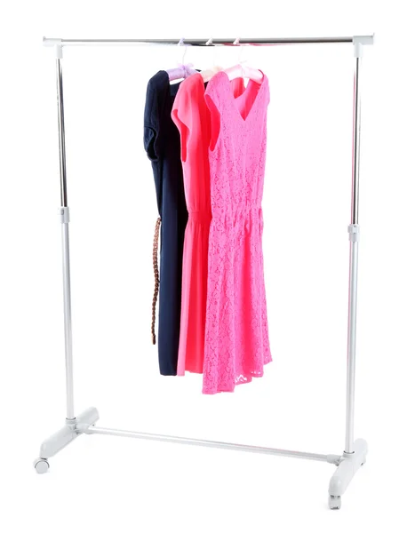 Beautiful dresses hanging on hangers isolated on white — Stock Photo, Image