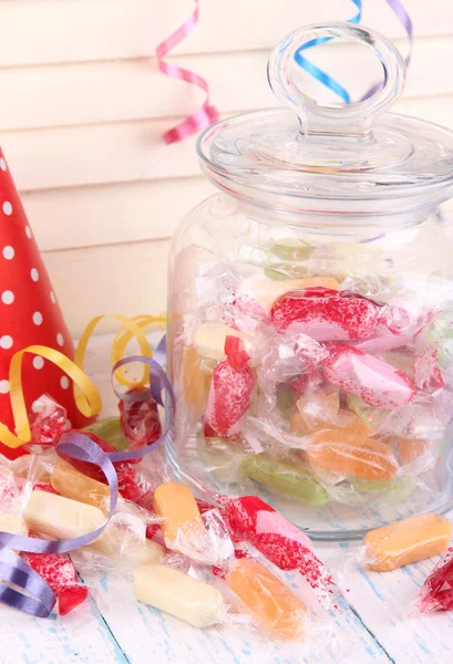 Tasty candies in jar on table close up — Stock Photo, Image