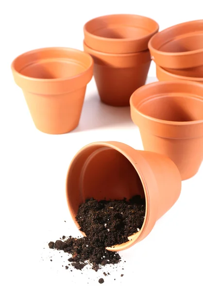 Clay flower pots and soil, isolated on white — Stock Photo, Image