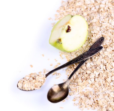 Apple ile üzerine beyaz izole, yulaf ezmesi ve vintage kaşık 