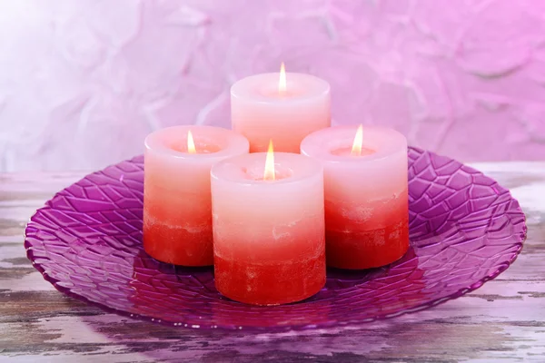 Beautiful candles on table on grey background — Stock Photo, Image