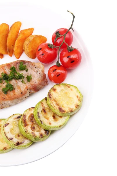 Grilled steak and grilled vegetables on plate, isolated on white — Stock Photo, Image