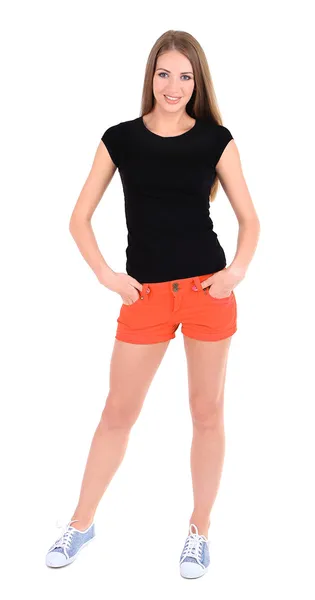 Menina bonita em shorts e camiseta isolada em branco — Fotografia de Stock